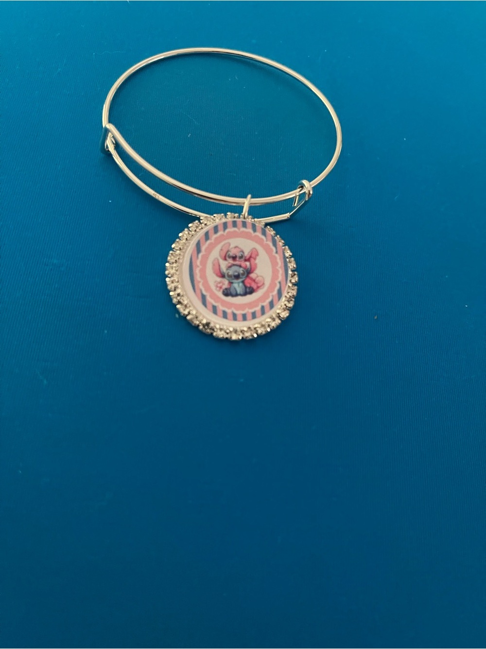 Gold-Tone Pink Pendant Bangle Bracelet
